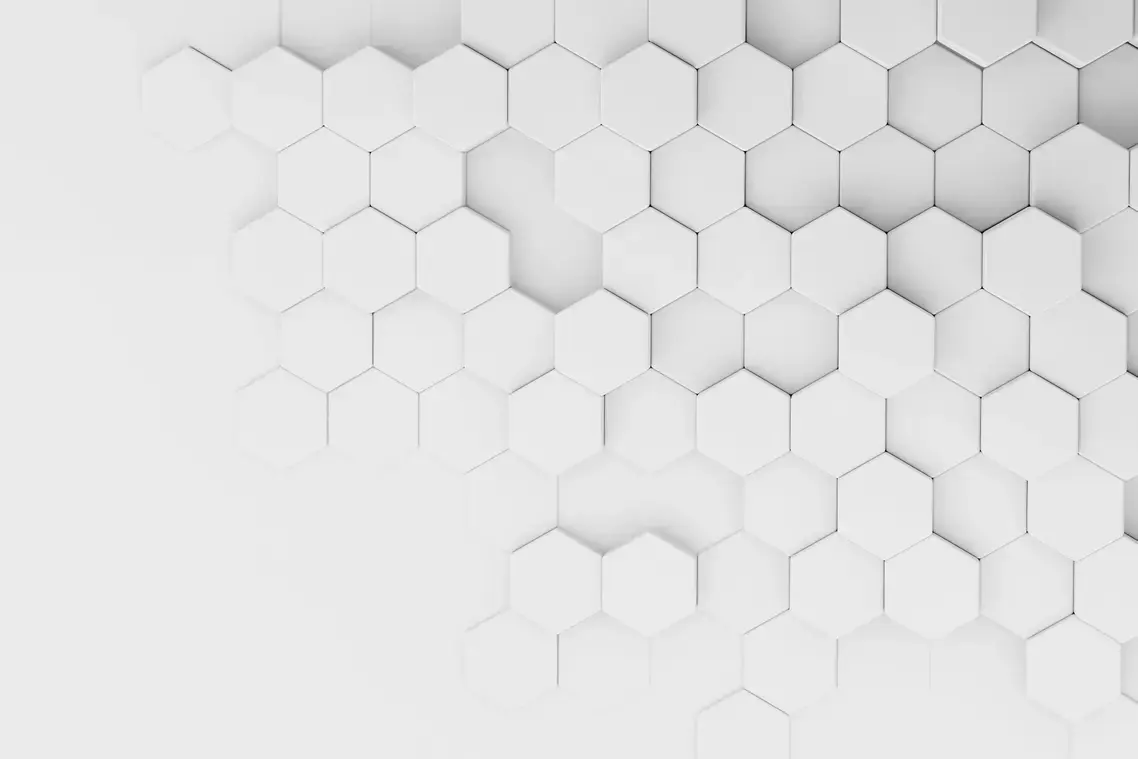 Superficie tridimensionale con pattern esagonale bianco, esempio di texture realistica tipica dello skeumorfismo