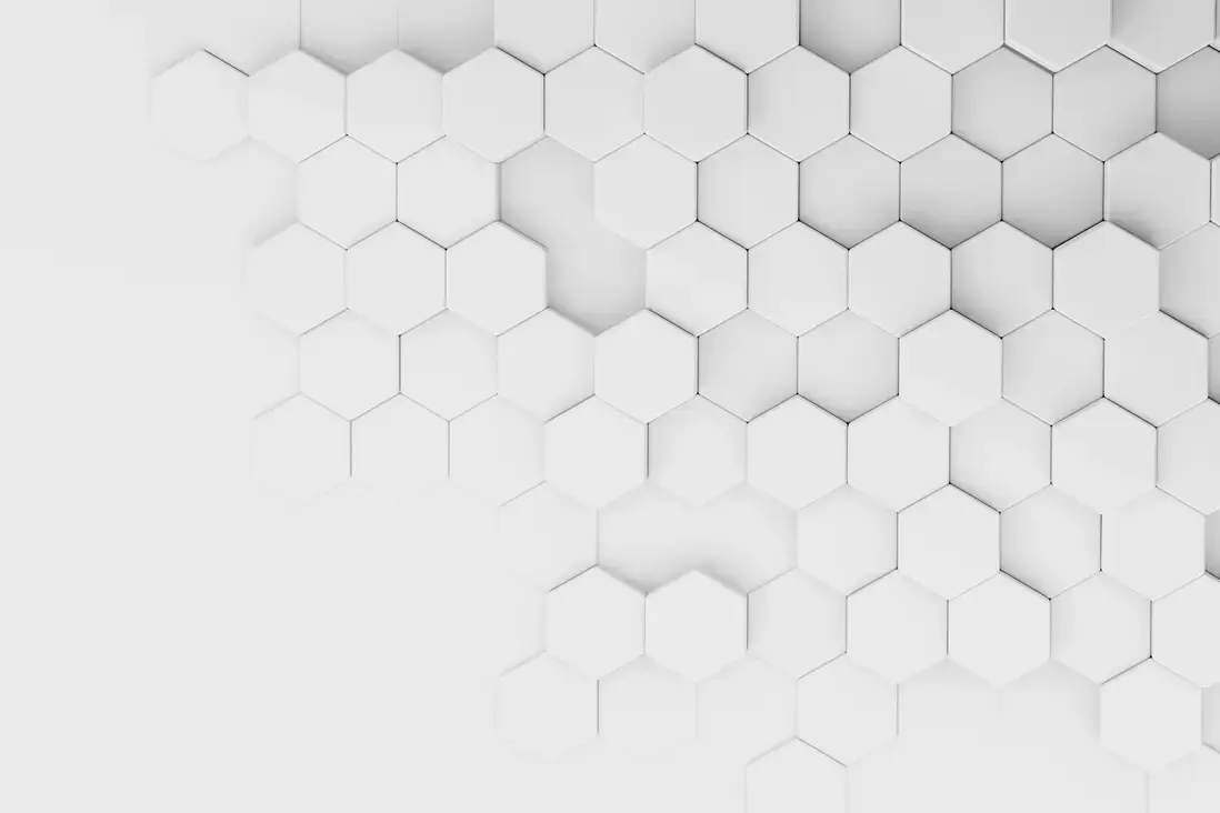 Superficie tridimensionale con pattern esagonale bianco, esempio di texture realistica tipica dello skeumorfismo